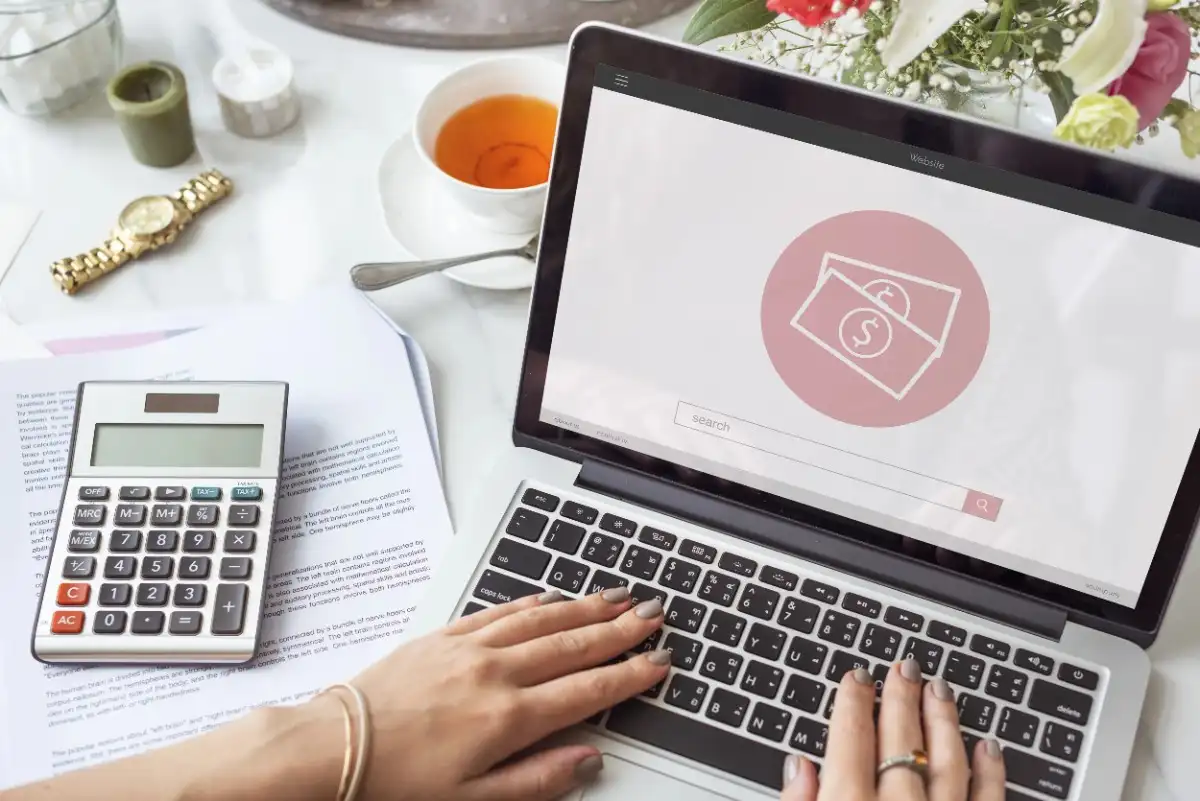 WPS compliant payroll software in Abu Dhabi, UAE displayed on a laptop with payroll calculations, salary processing, and workforce management tools.